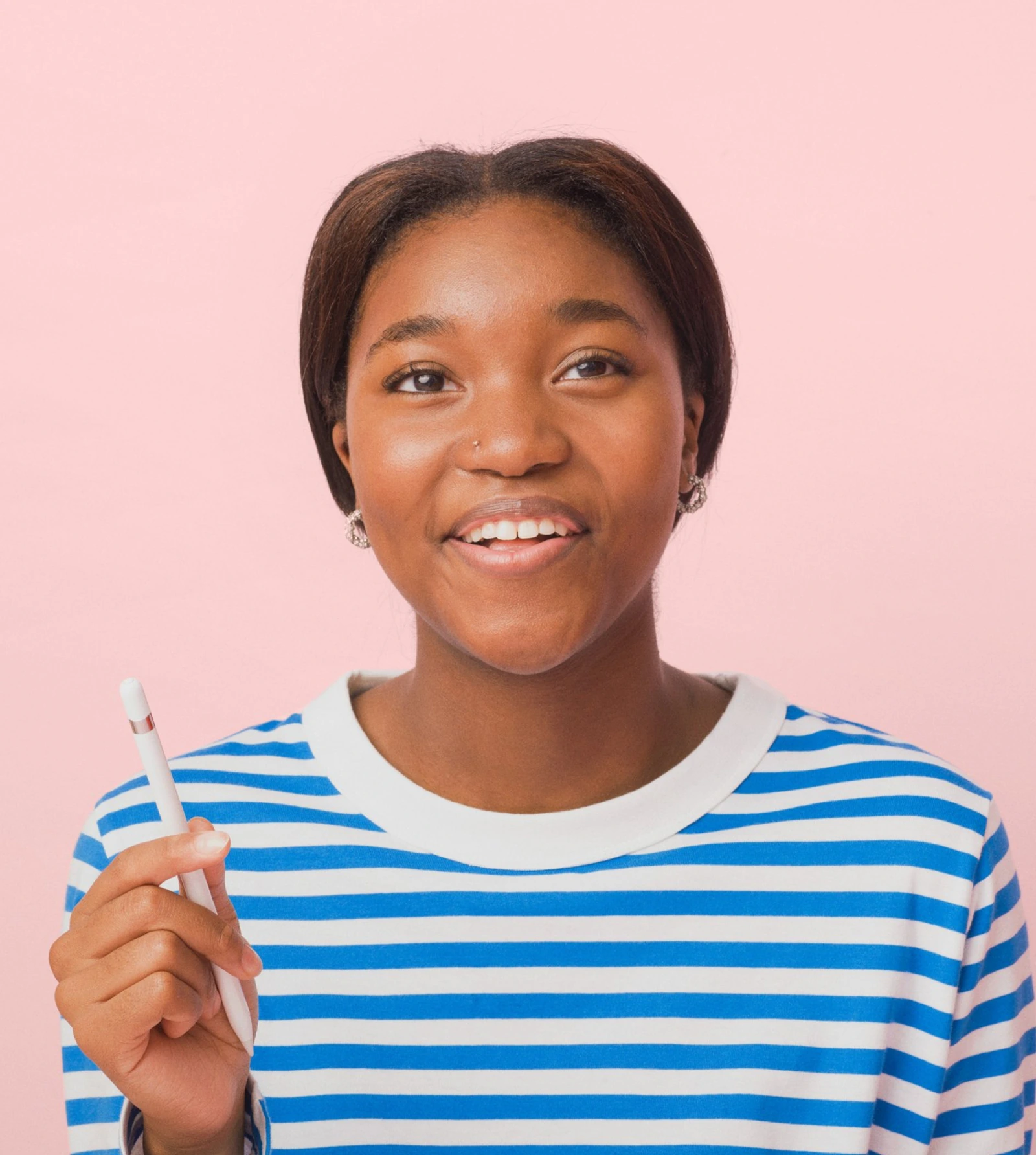 Sora Schools brand portrait of a student against a pink background